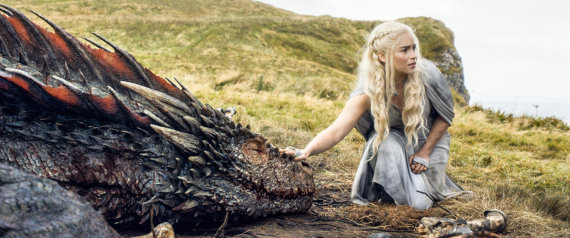In this image released by HBO, Emilia Clarke appears in a scene from "Game of Thrones. Clarke was nominated for an Emmy Award on Thursday, July 16, 2015, for outstanding supporting actress in a drama series for her role on the show. The 67th Annual Primetime Emmy Awards will take place on Sept. 20, 2015.  (HBO via AP)